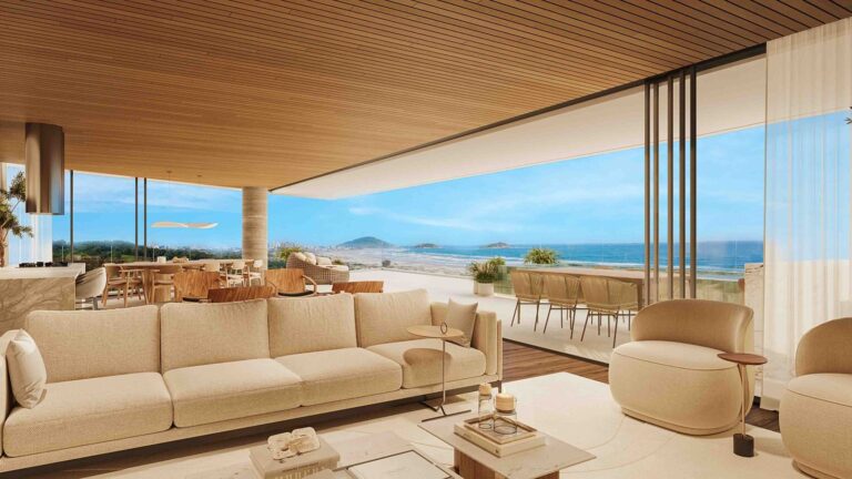 Imagem ilustrativa de sala com varanda e vista para o mar no VIEW Ocean